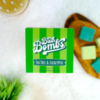 Green box of Bath Bombs with Tea Tree & Eucalyptus scent on a white background