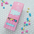 Unicorn poop mini bath bomb box on a white background